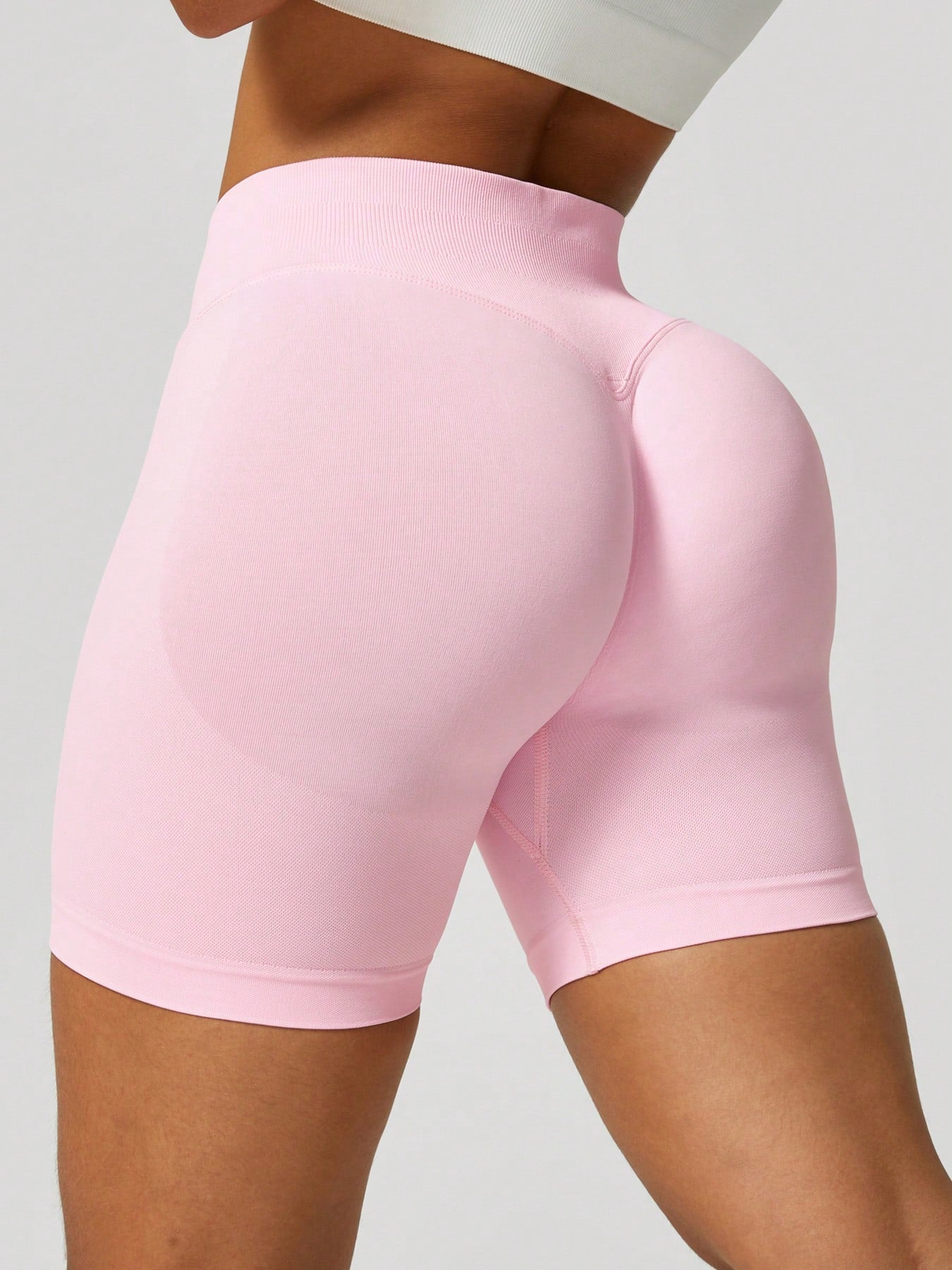 Sculpt high-rise seamless shorts The Quiet & Co. — back view natural shape — Pink