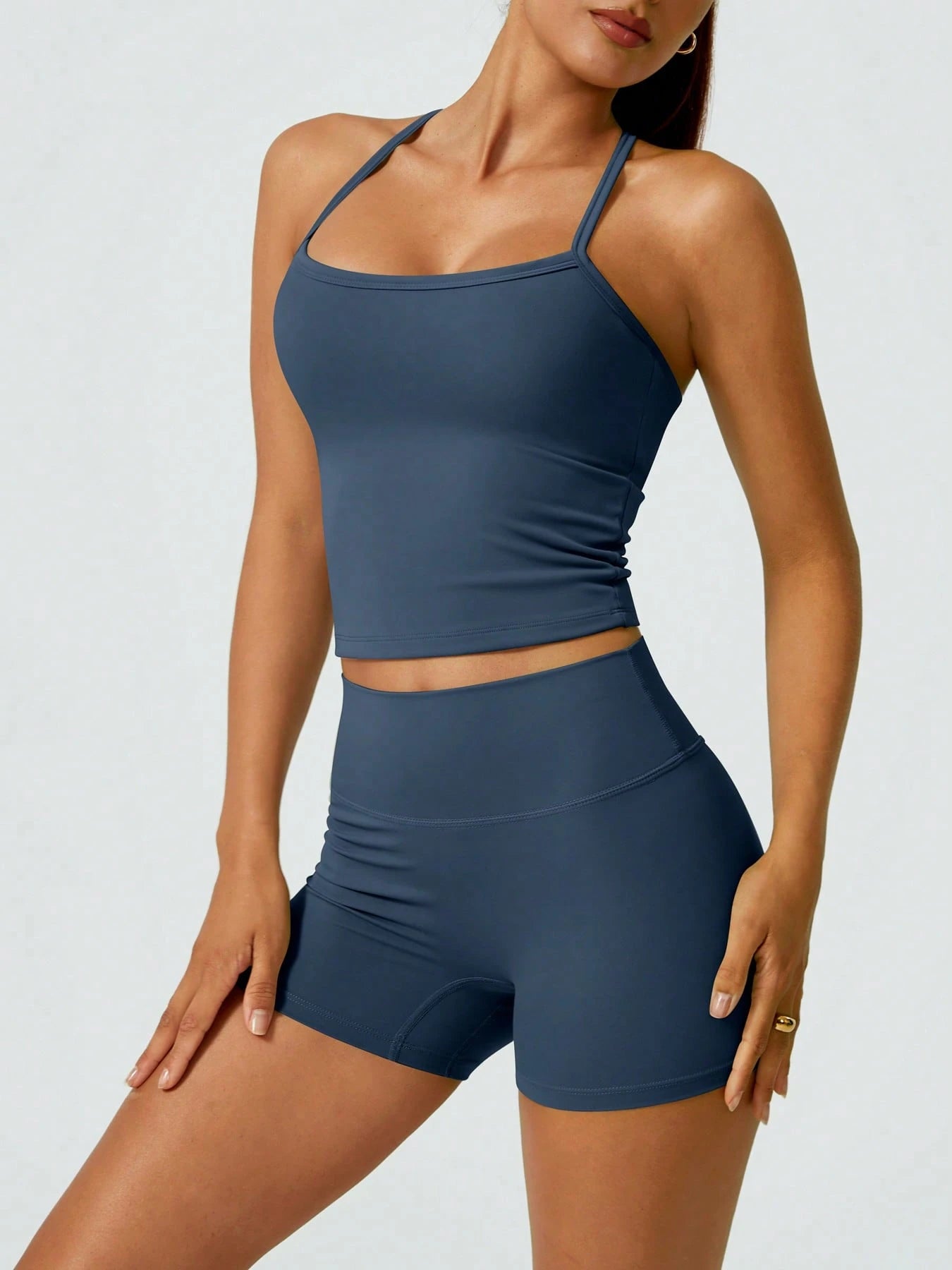 Halter studio coordinated set The Quiet & Co. — back view sculpted silhouette — Navy Blue