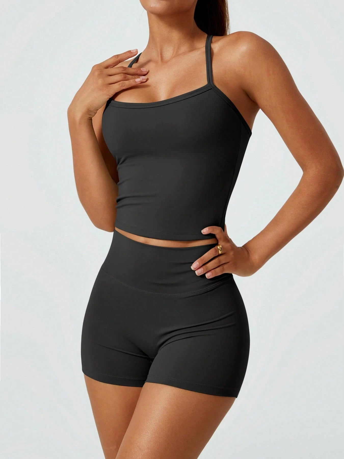 Halter studio coordinated set The Quiet & Co. — back view sculpted silhouette — Black