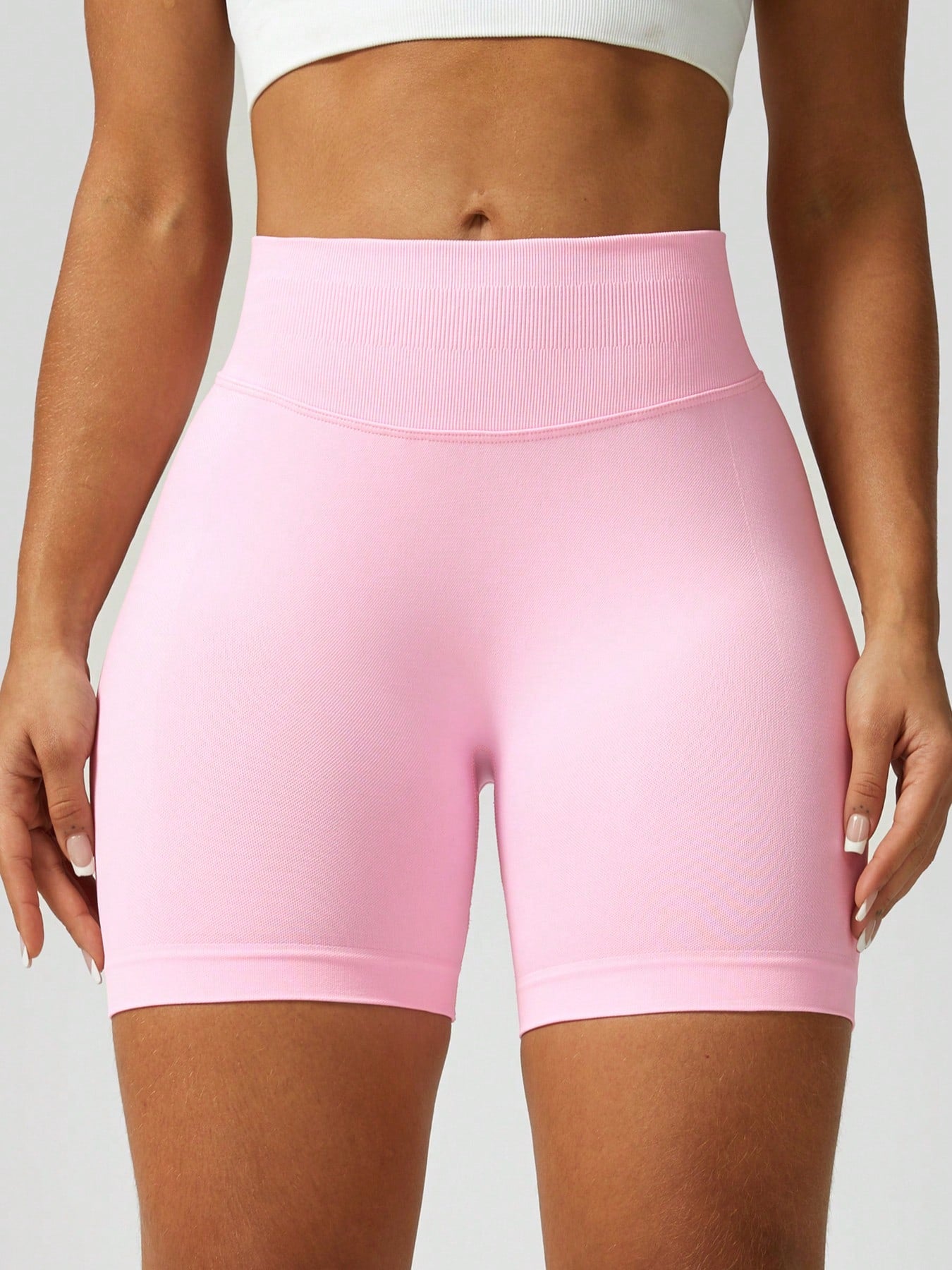 Sculpt high-rise seamless shorts The Quiet & Co. — back view natural shape — Pink