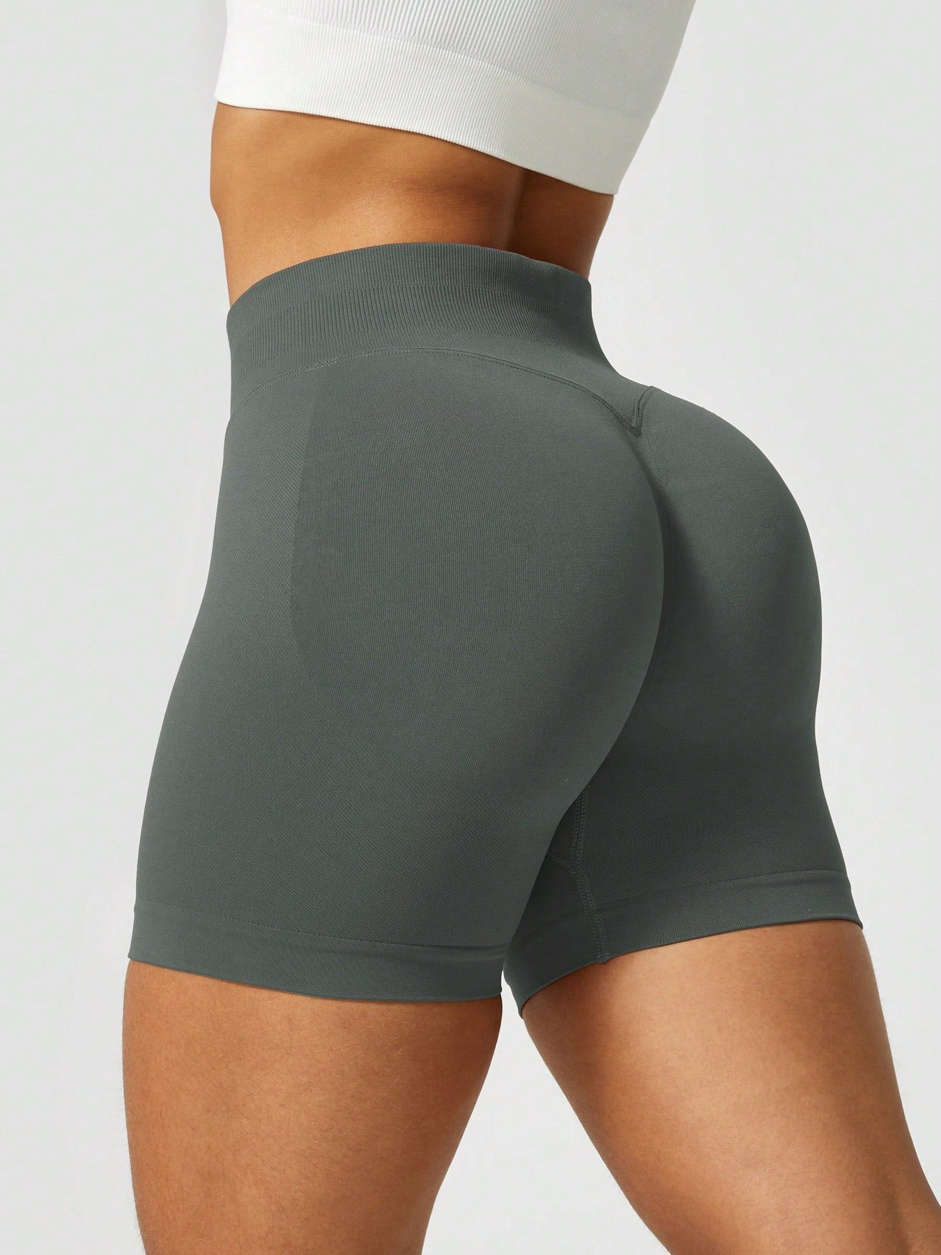 Sculpt high-rise seamless shorts The Quiet & Co. — back view natural shape — Dark Grey