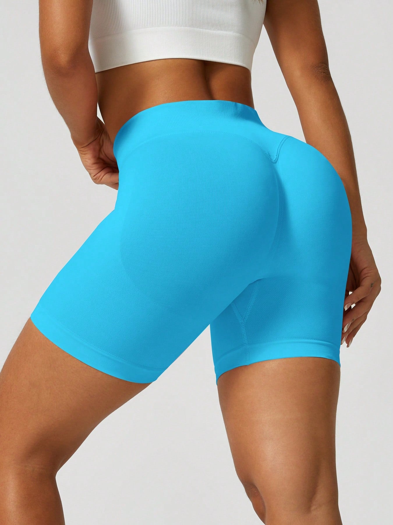 Sculpt high-rise seamless shorts The Quiet & Co. — back view natural shape — Blue