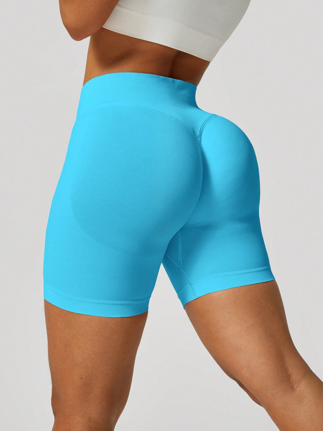 Sculpt high-rise seamless shorts The Quiet & Co. — back view natural shape — Blue