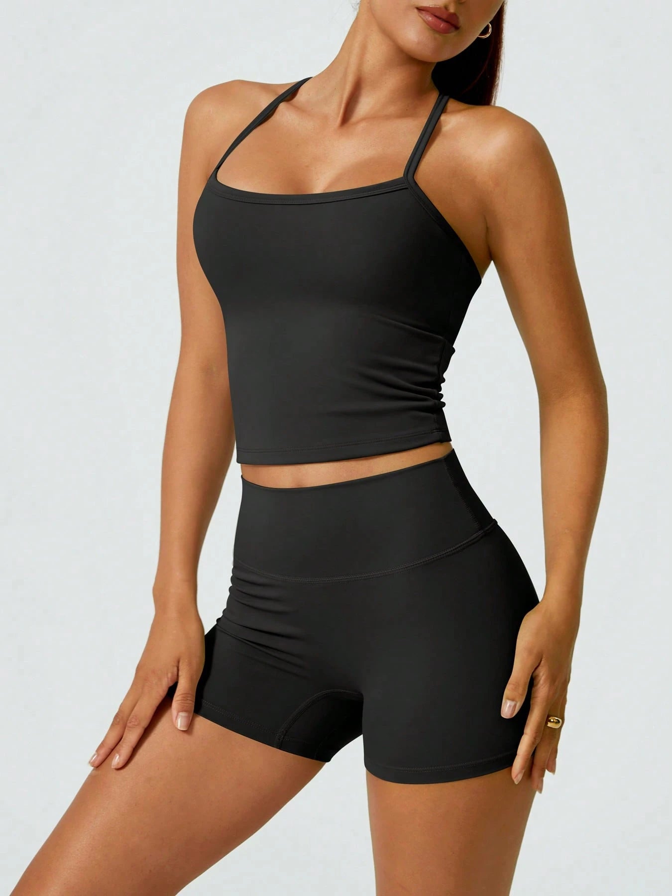 Halter studio coordinated set The Quiet & Co. — back view sculpted silhouette — Black