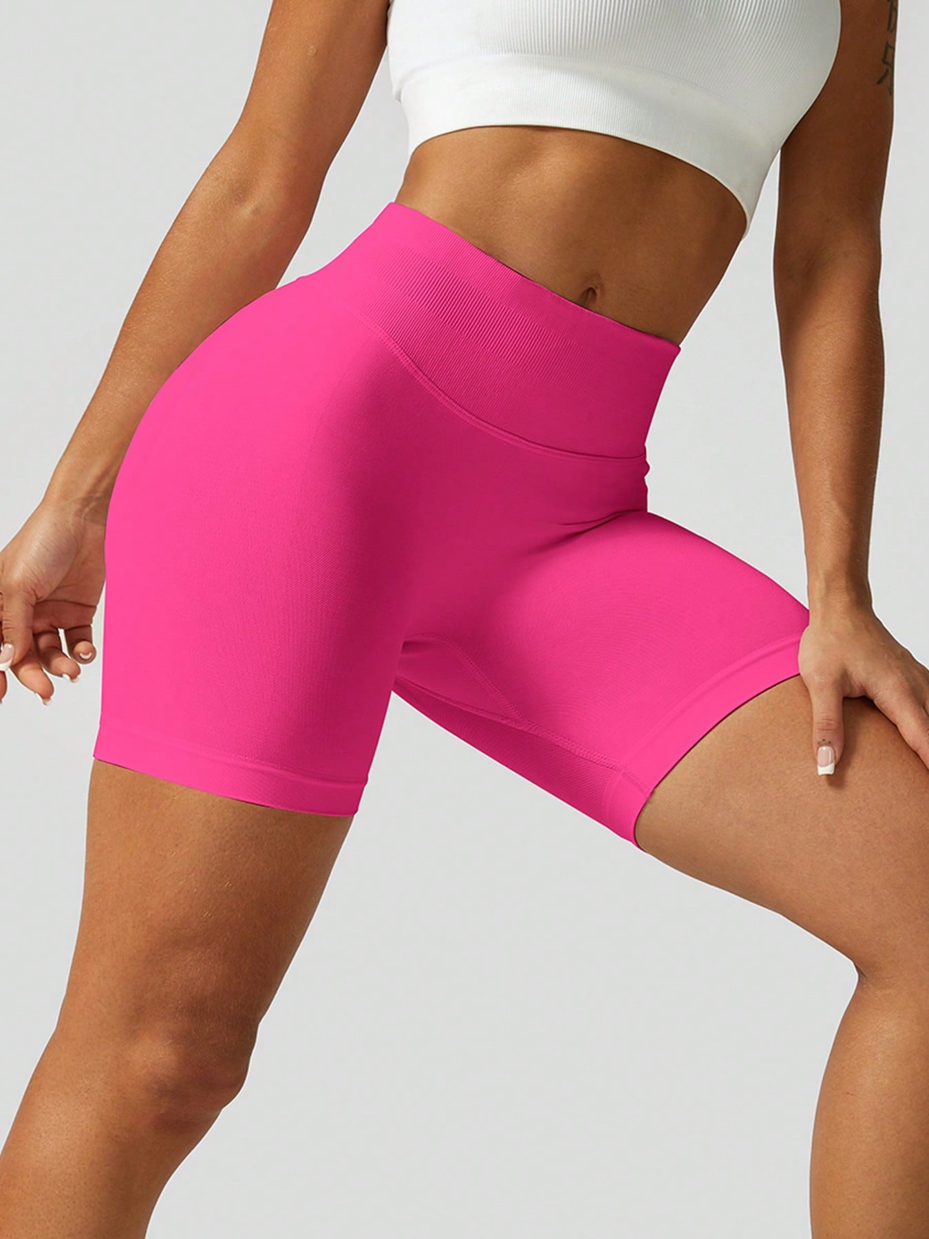Sculpt high-rise seamless shorts The Quiet & Co. — back view natural shape — Hot Pink