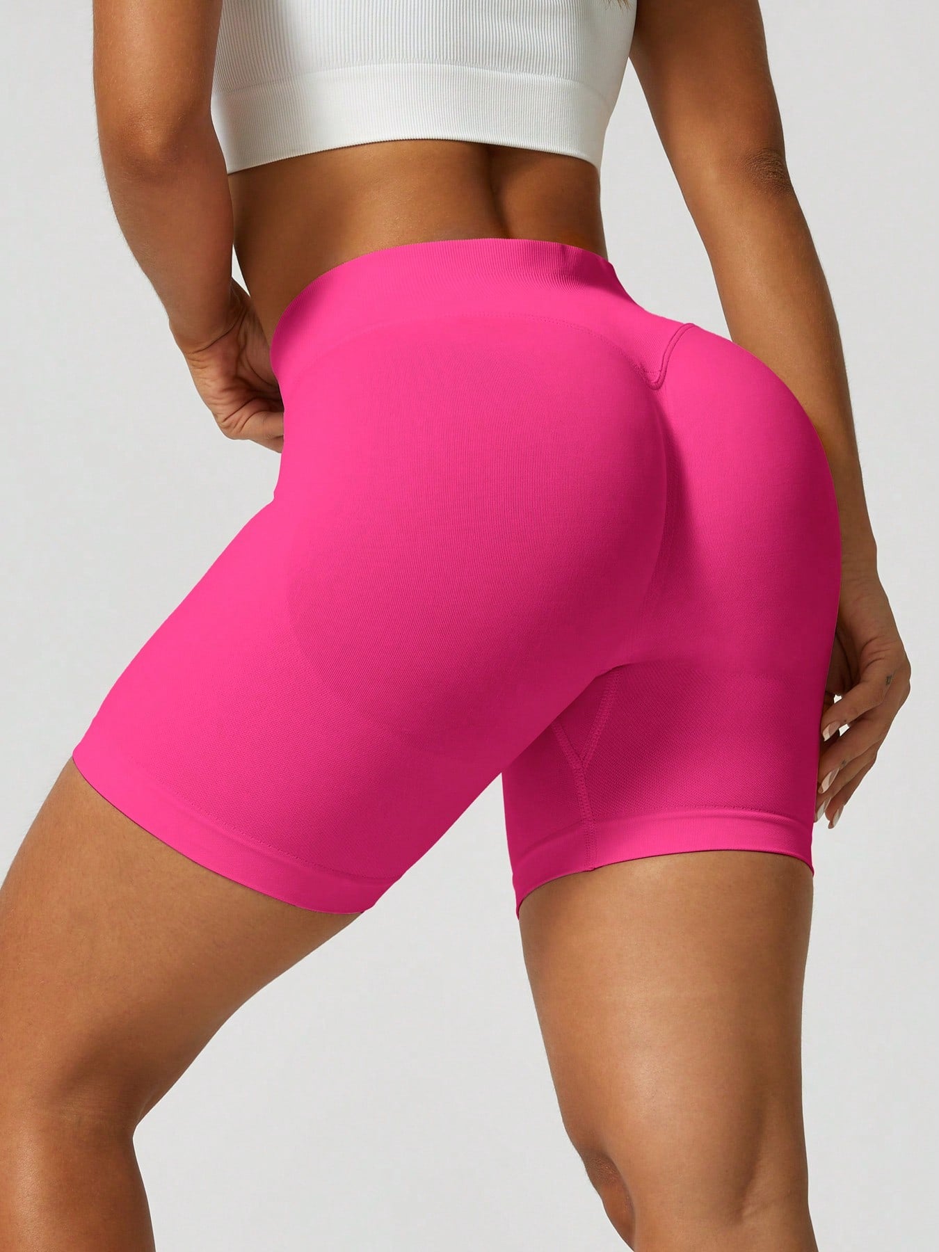 Sculpt high-rise seamless shorts The Quiet & Co. — back view natural shape — Hot Pink