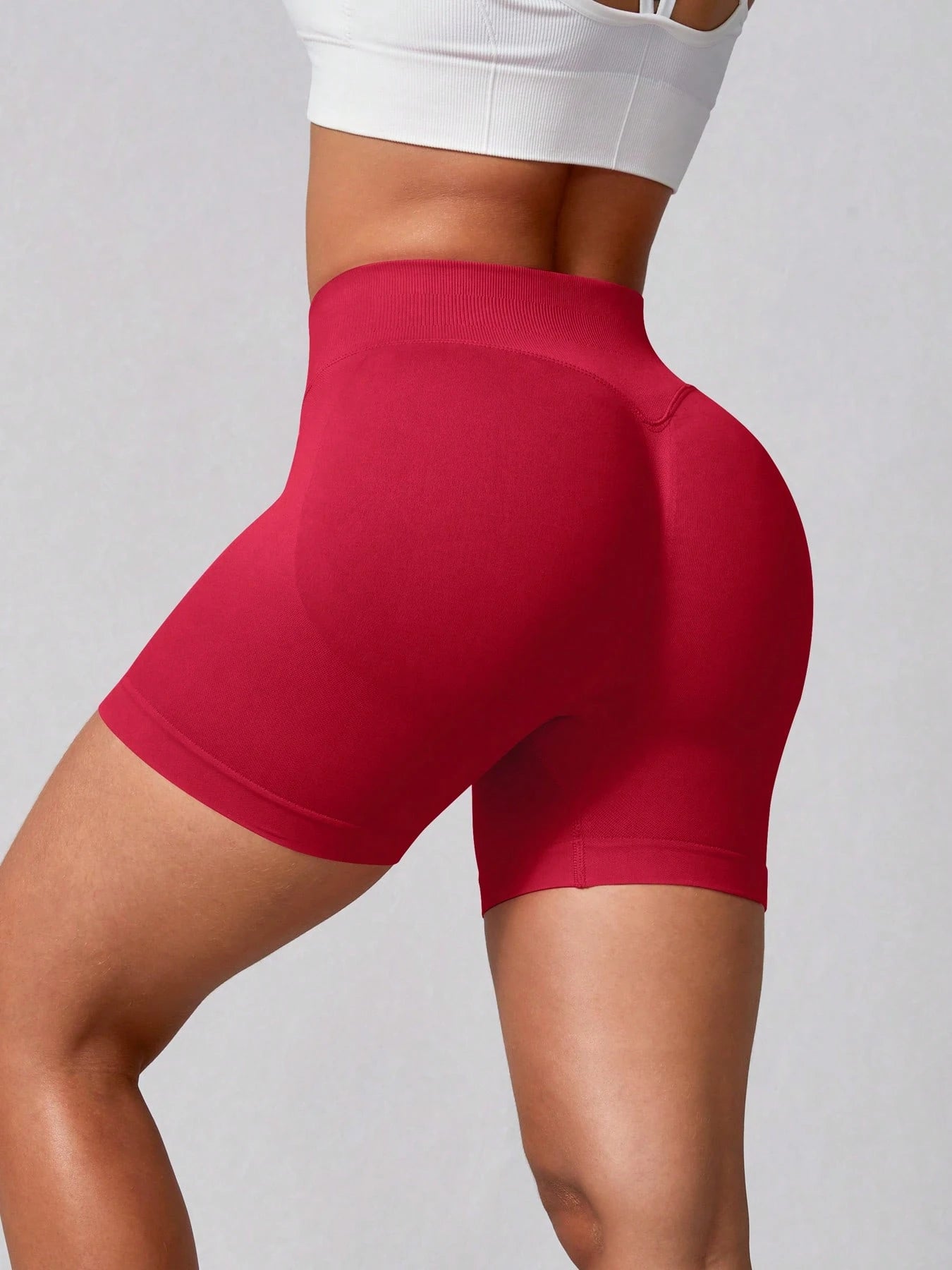 Sculpt high-rise seamless shorts The Quiet & Co. — back view natural shape — Fiery Red