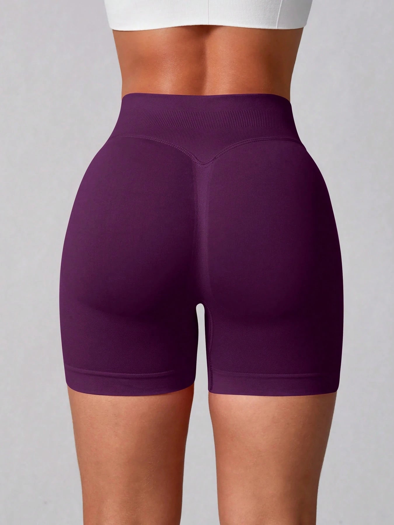Sculpt high-rise seamless shorts The Quiet & Co. — back view natural shape — Bold Plum