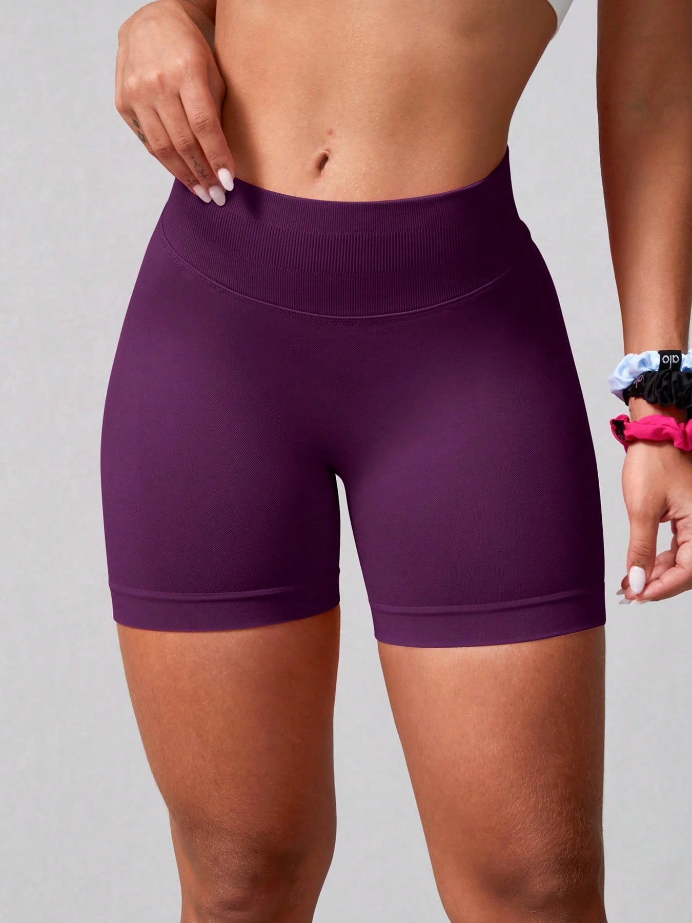 Sculpt high-rise seamless shorts The Quiet & Co. — back view natural shape — Bold Plum