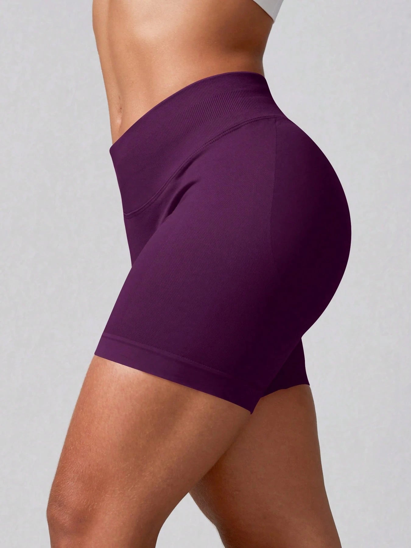 Sculpt high-rise seamless shorts The Quiet & Co. — back view natural shape — Bold Plum