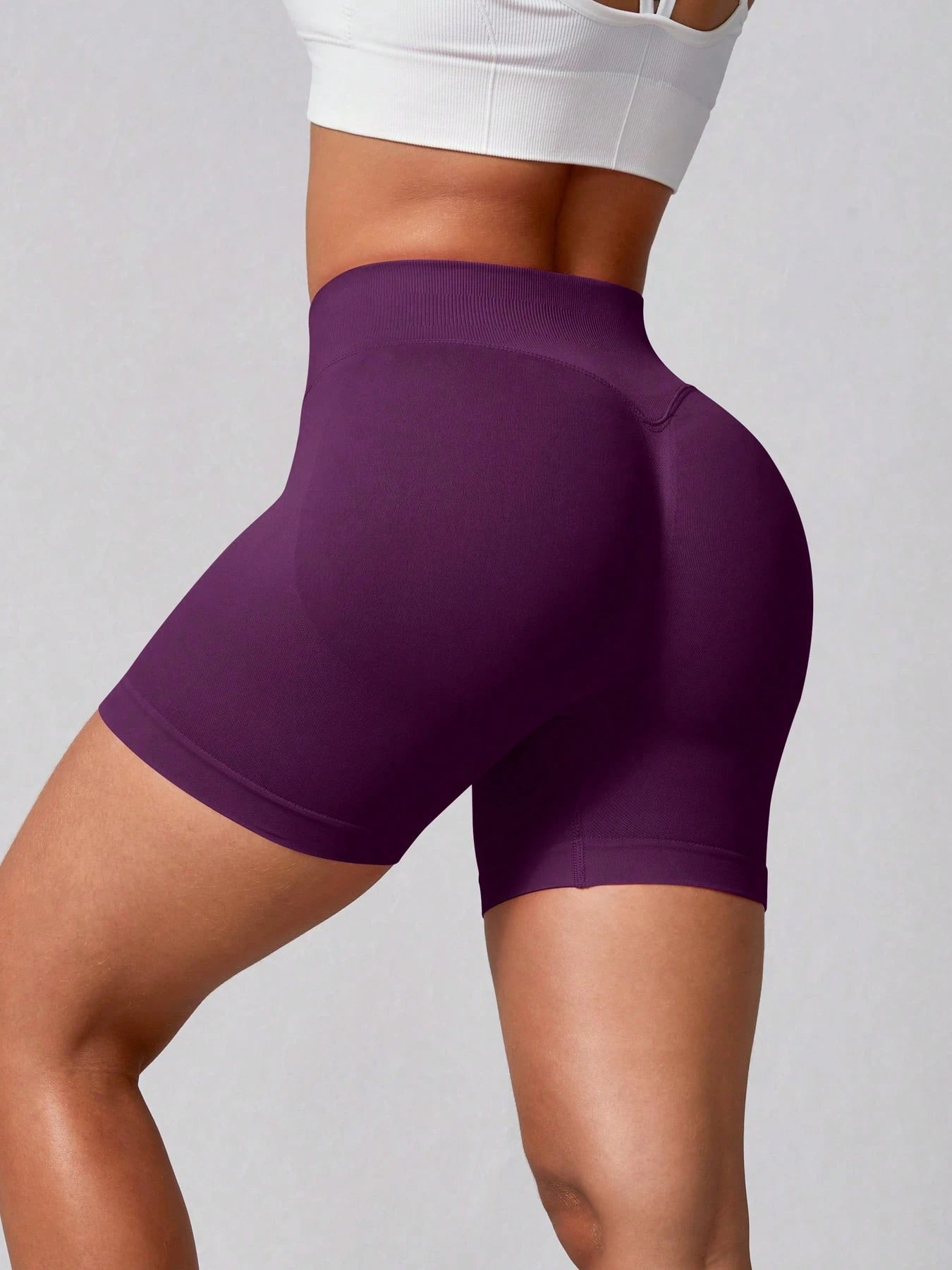 Sculpt high-rise seamless shorts The Quiet & Co. — back view natural shape — Bold Plum
