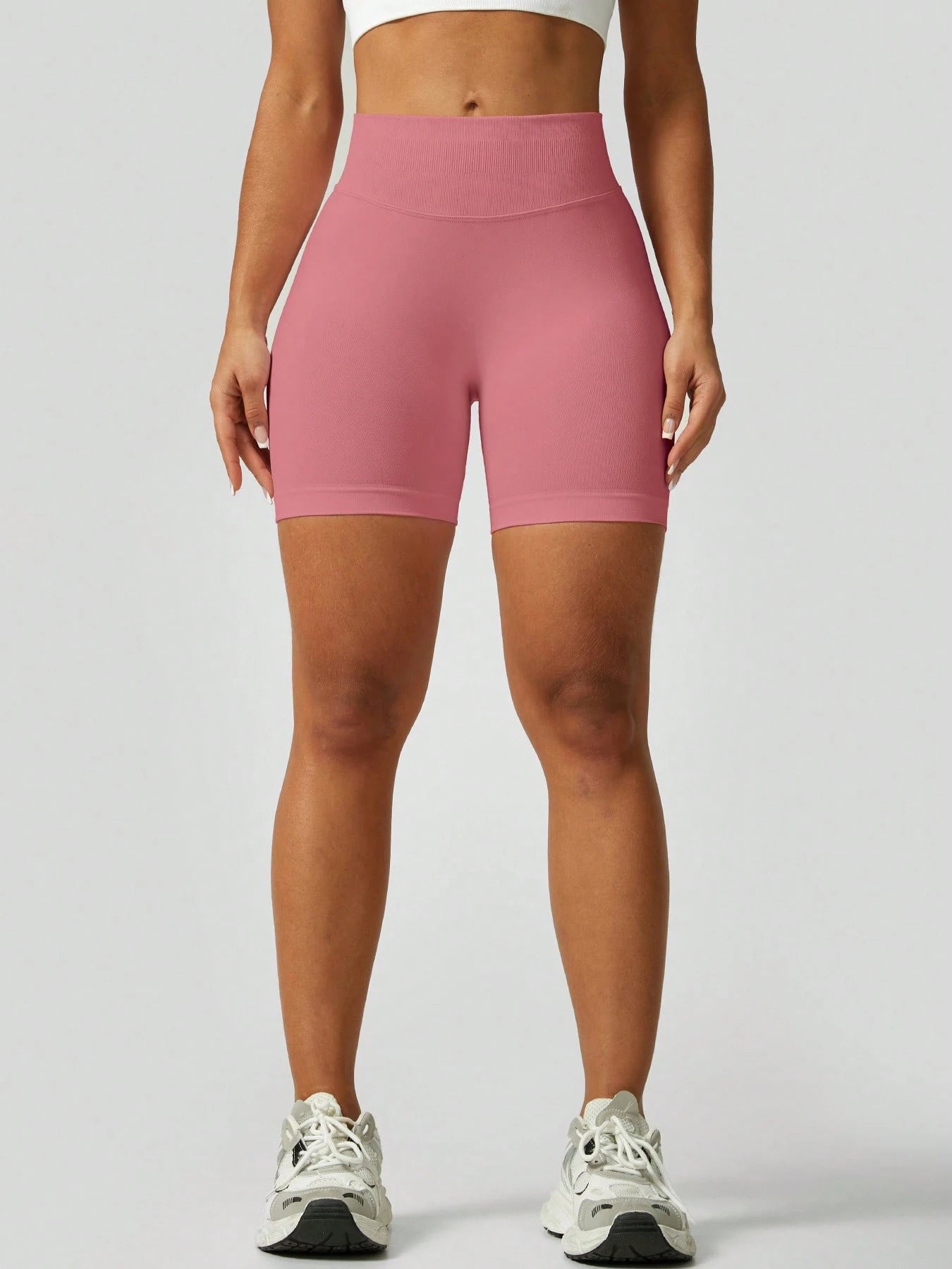 Sculpt high-rise seamless shorts The Quiet & Co. — back view natural shape — Pink