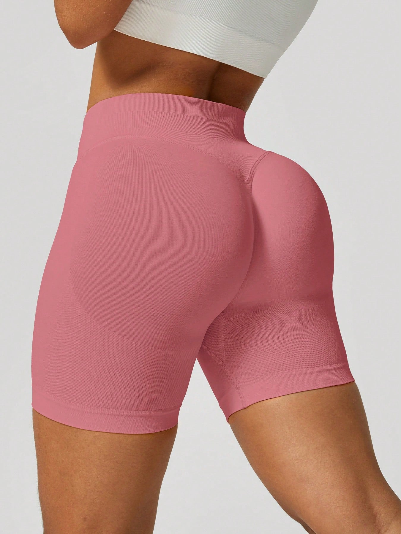 Sculpt high-rise seamless shorts The Quiet & Co. — back view natural shape — Pink