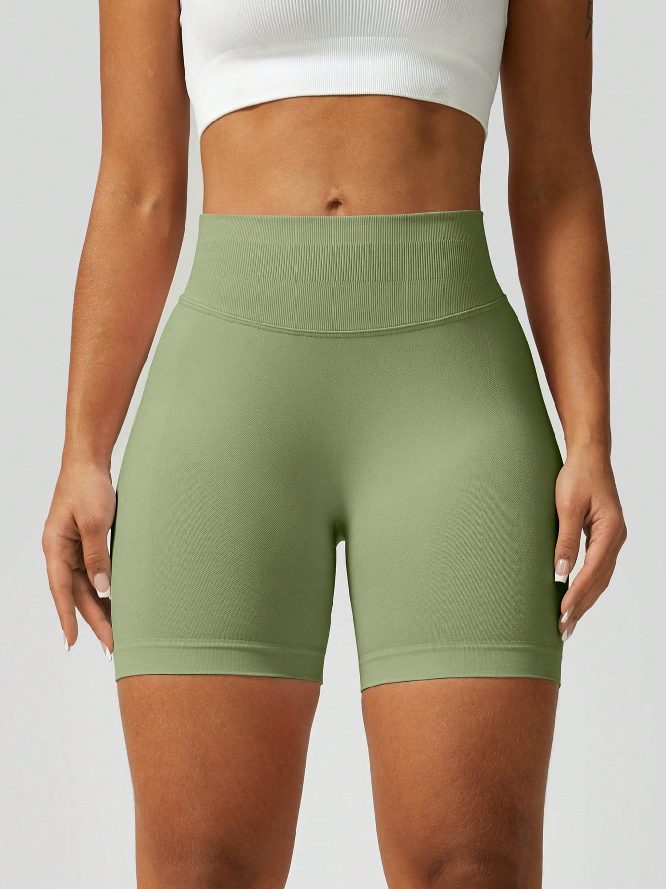 Sculpt high-rise seamless shorts The Quiet & Co. — back view natural shape — Green