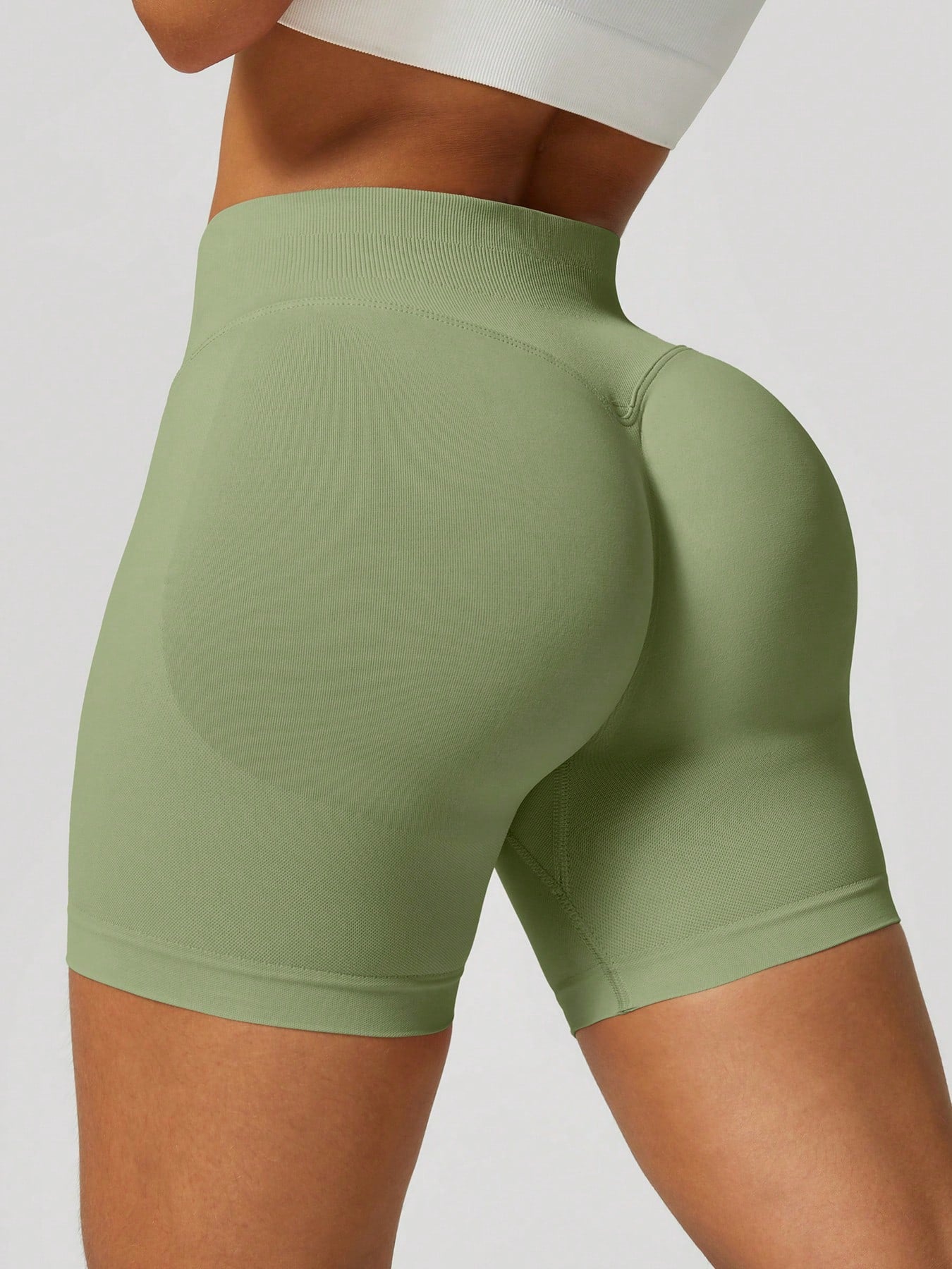 Sculpt high-rise seamless shorts The Quiet & Co. — back view natural shape — Green