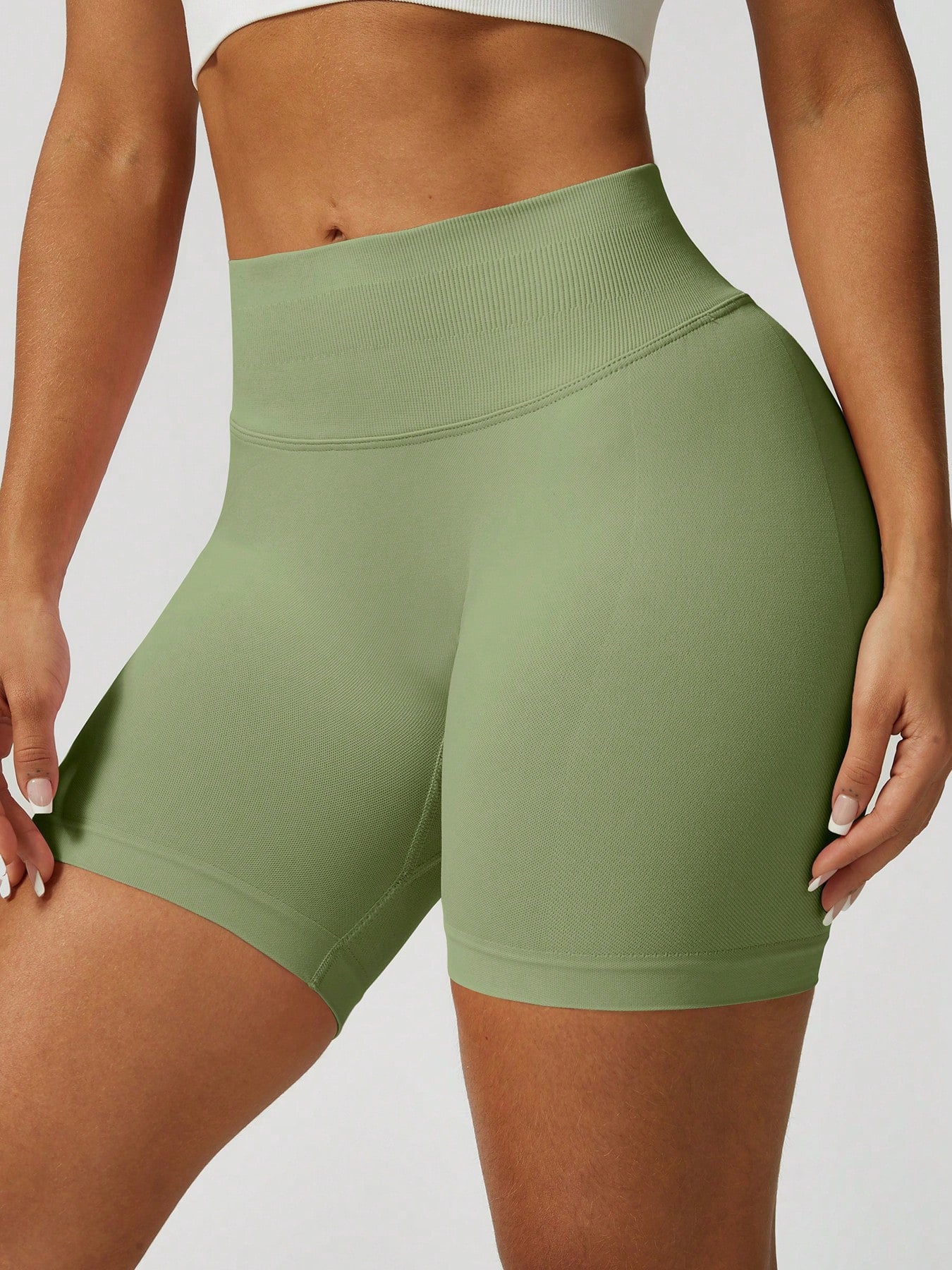 Sculpt high-rise seamless shorts The Quiet & Co. — back view natural shape — Green