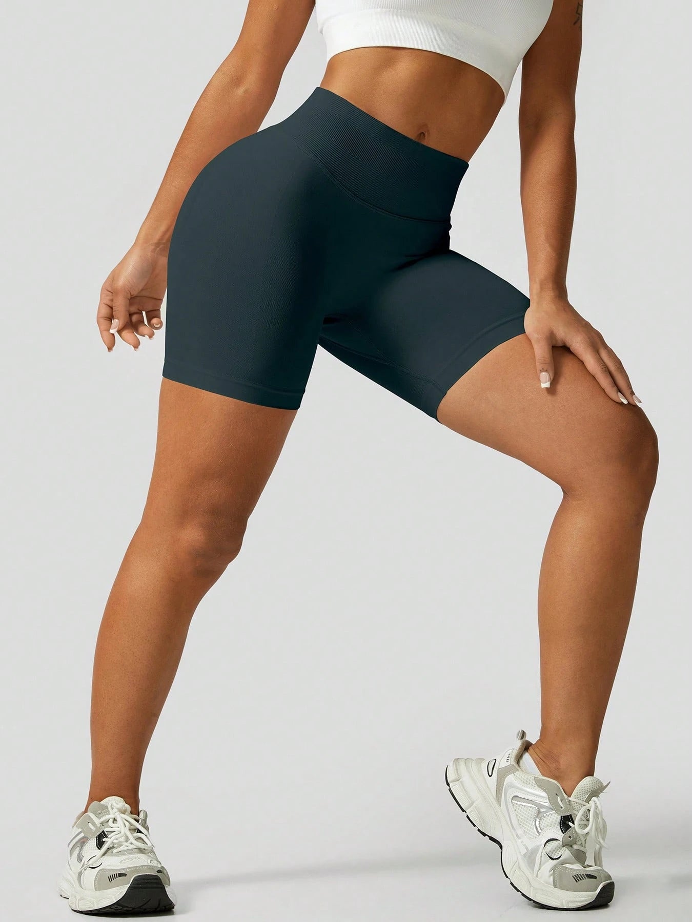 Sculpt high-rise seamless shorts The Quiet & Co. — back view natural shape — Dark Green