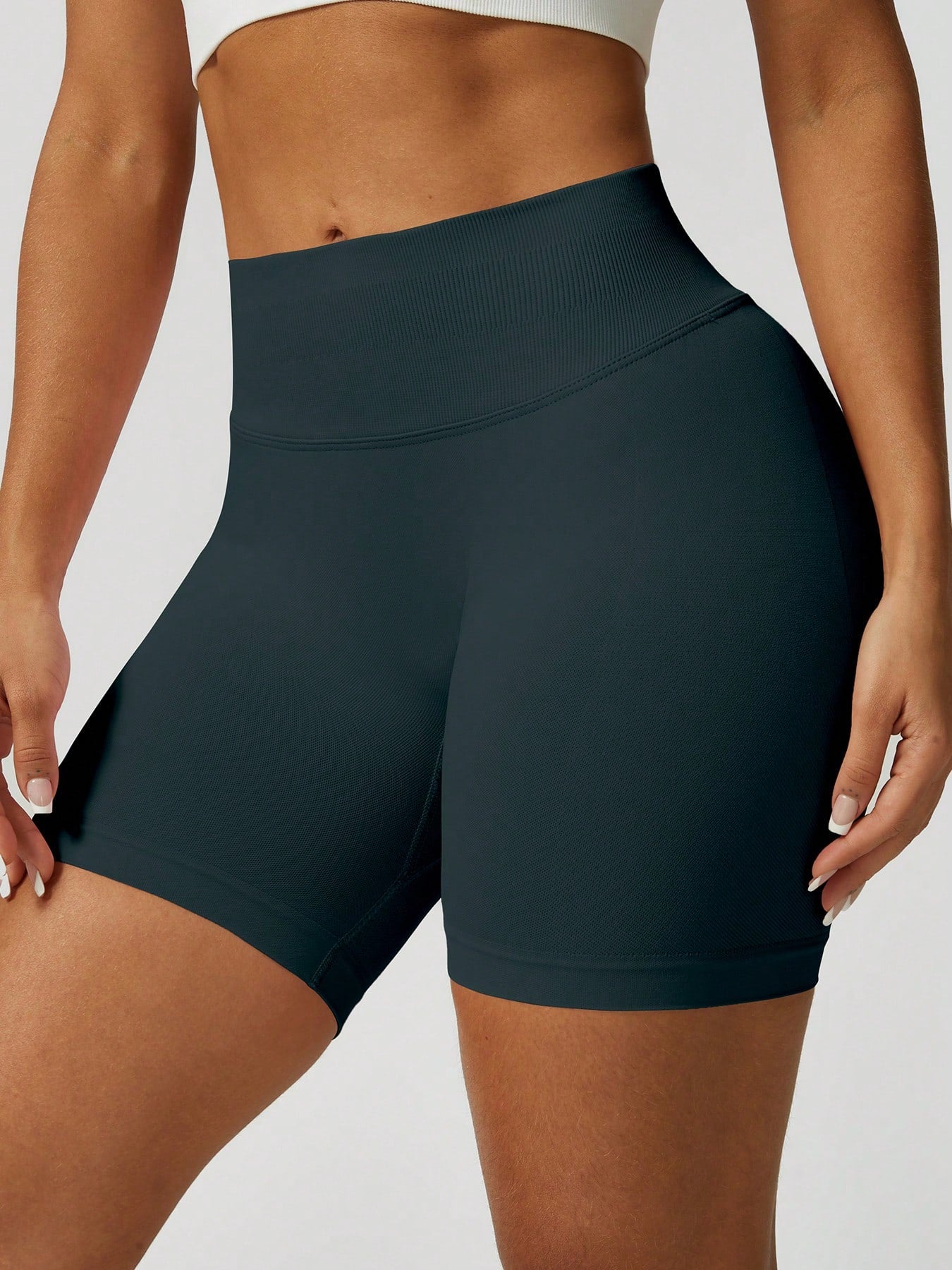 Sculpt high-rise seamless shorts The Quiet & Co. — back view natural shape — Dark Green