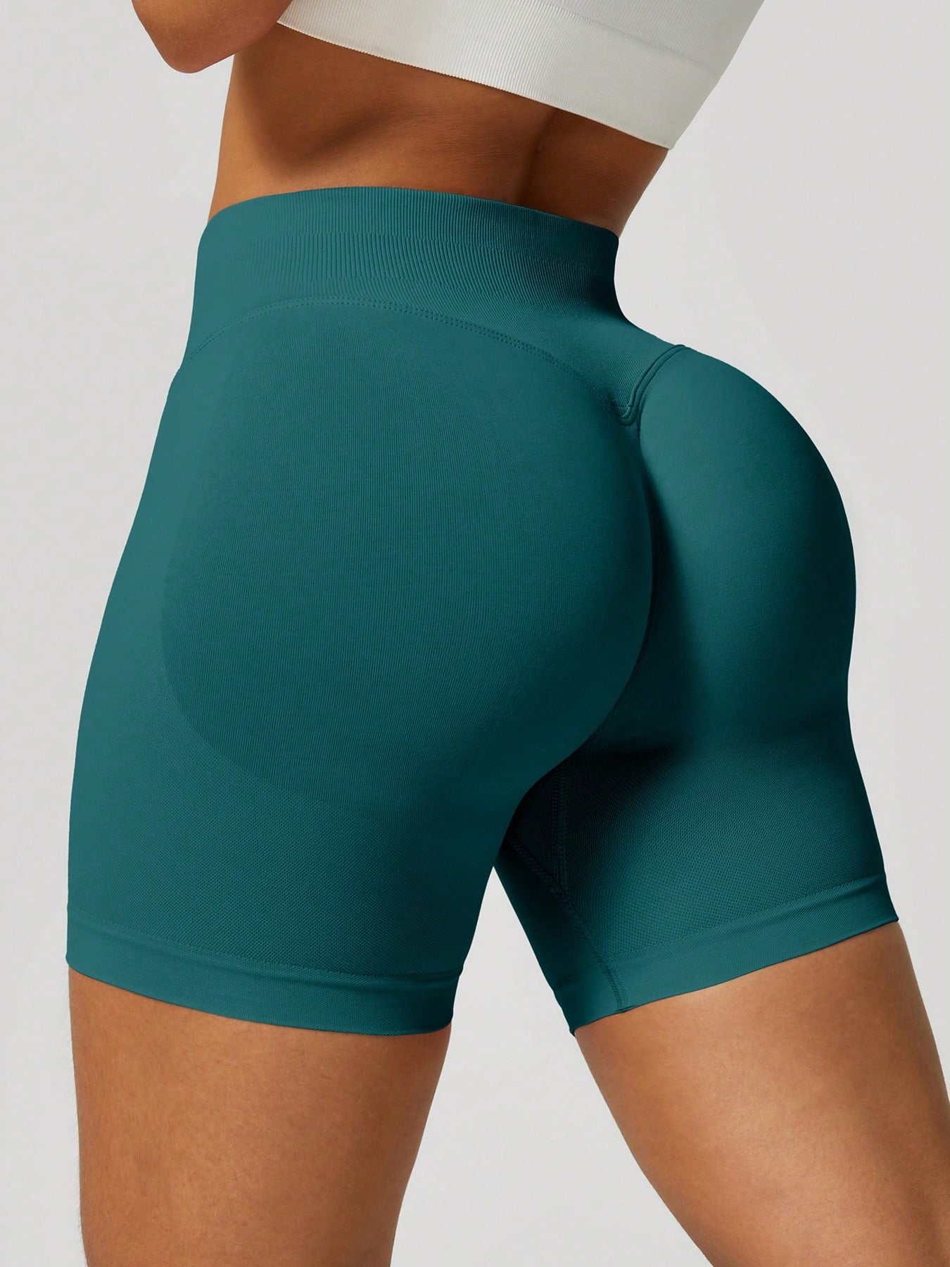 Sculpt high-rise seamless shorts The Quiet & Co. — back view natural shape — Blue