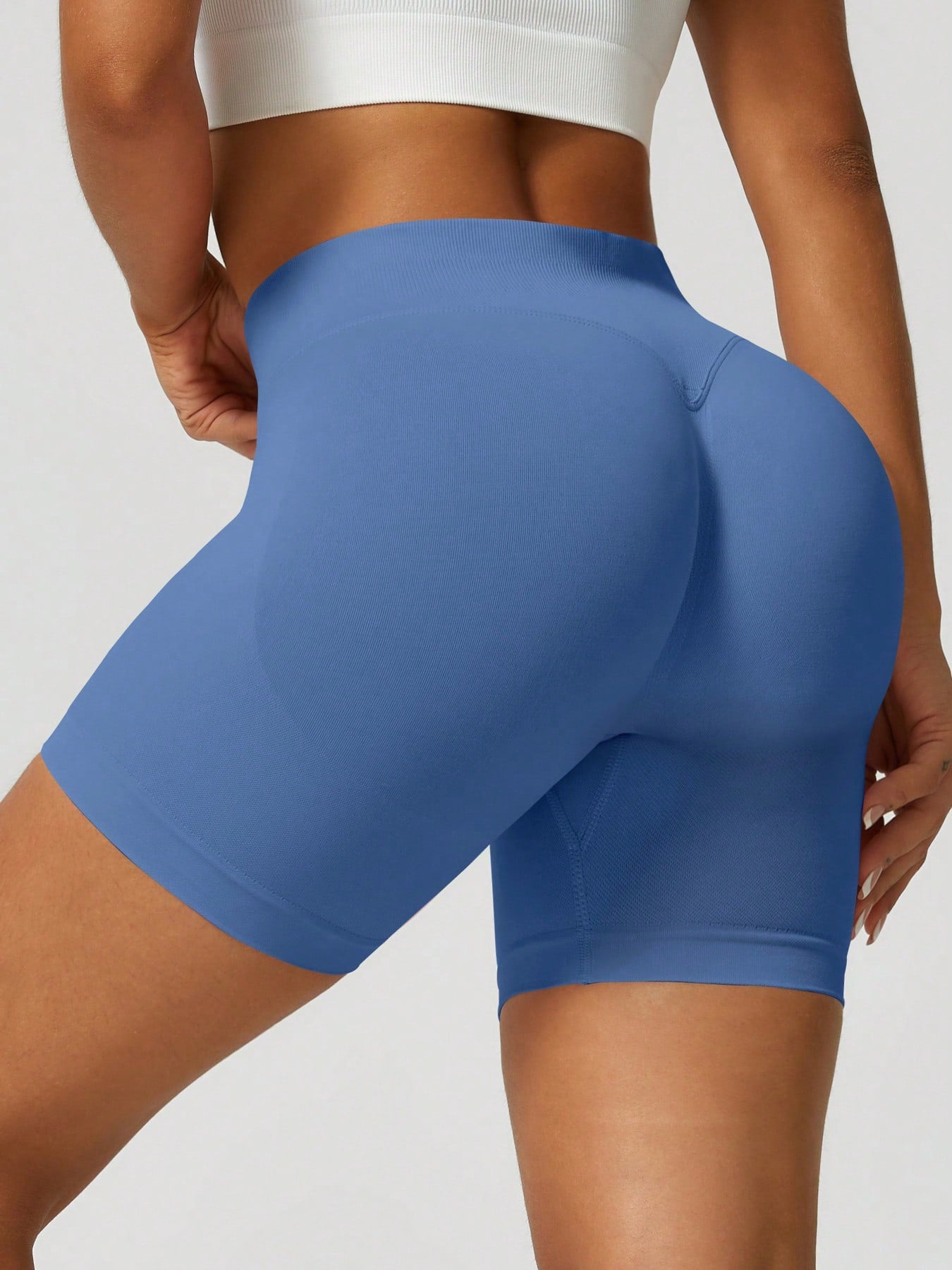 Sculpt high-rise seamless shorts The Quiet & Co. — back view natural shape — Blue