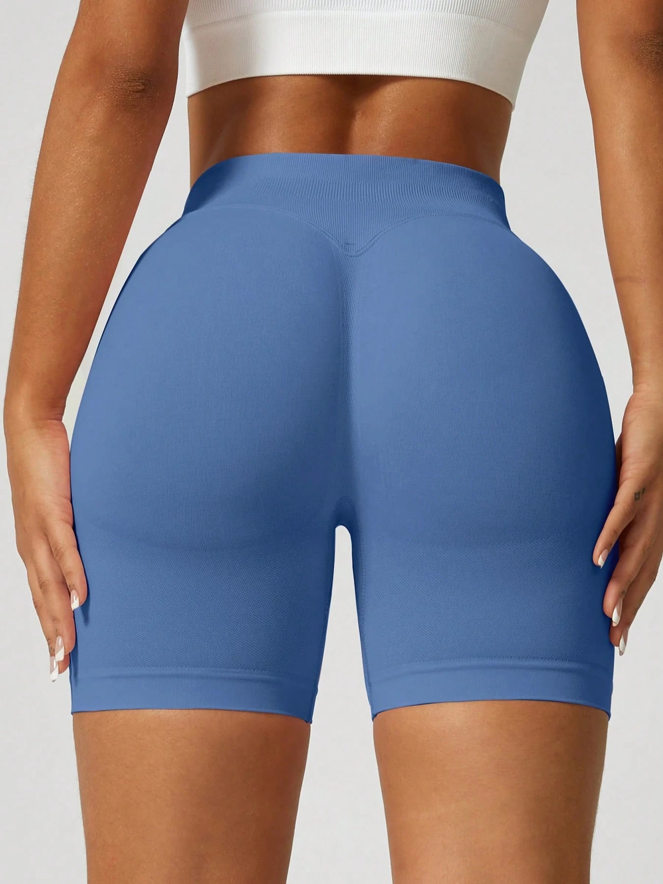 Sculpt high-rise seamless shorts The Quiet & Co. — back view natural shape — Blue